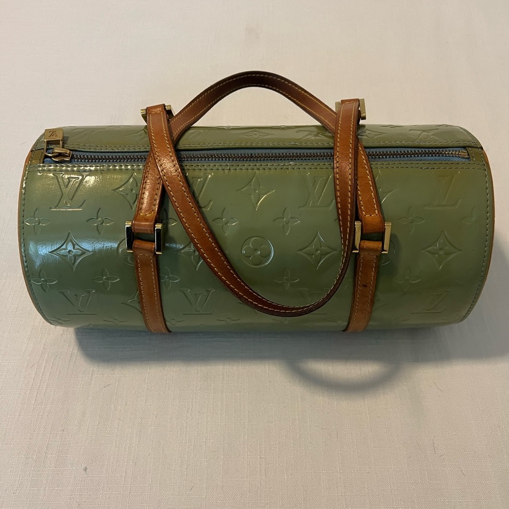authentic Louis Vuitton barrel purse.
